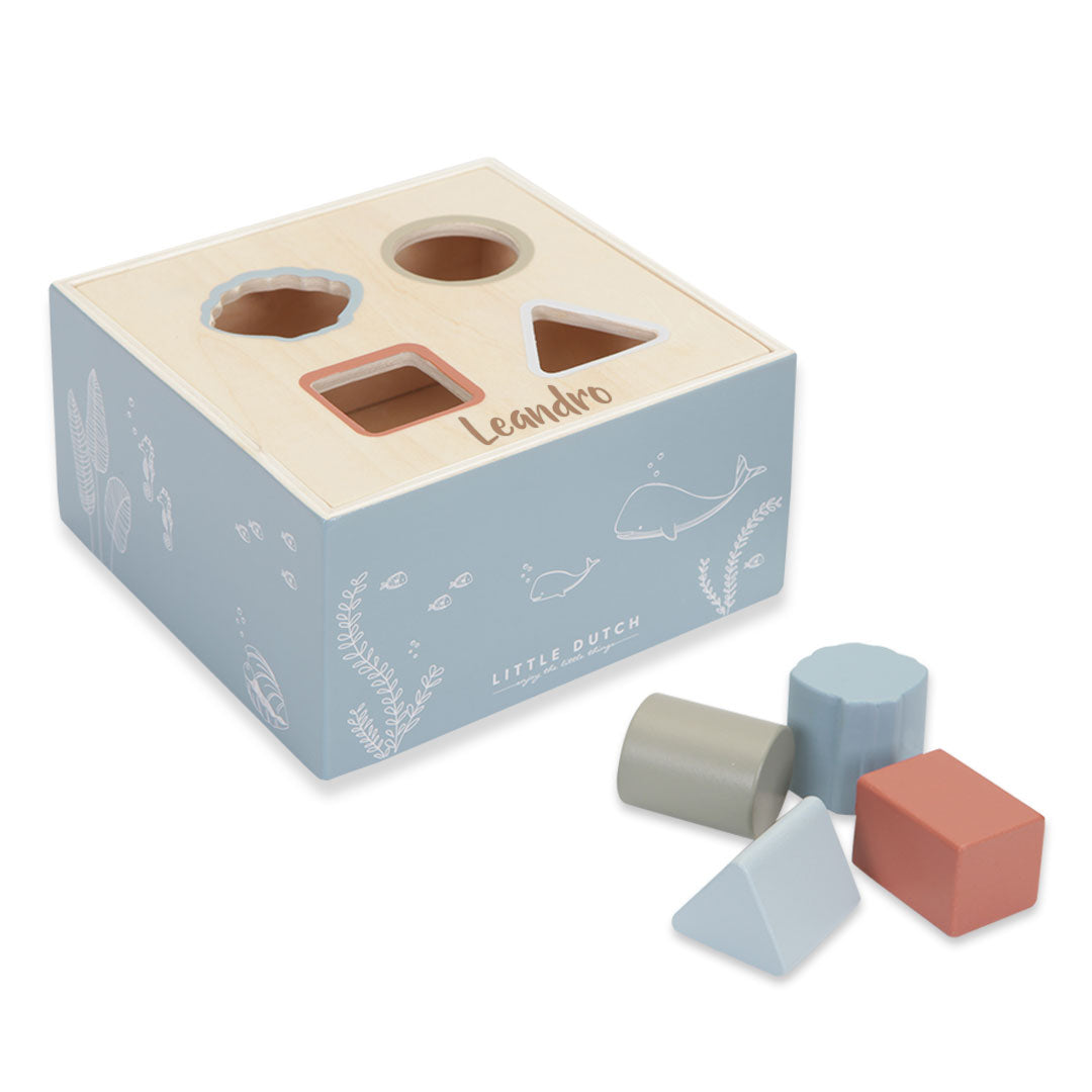 Jeu d'encastrement de formes en bois bleu